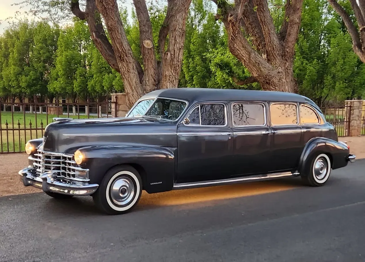 White 1946 Cadillac Airport Limousine exterior for limo rental White 1946 Cadillac Airport Limousine exterior for limo rental