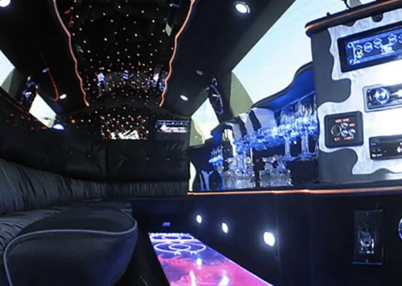 Lincoln Towncar Limo Tuxedo interior with LED accent lighting, starlight or fiber-optic ceiling and lit dance floor for limo rental Lincoln Towncar Limo Tuxedo interior with LED accent lighting, starlight or fiber-optic ceiling and lit dance floor for limo rental